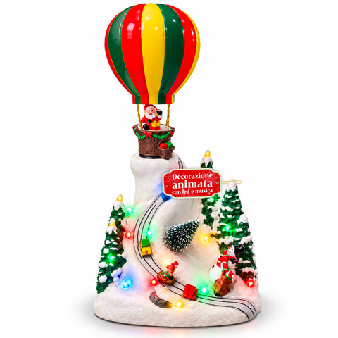 Paesaggio Natalizio con Babbo Natale in Volo, Luci LED e Musica