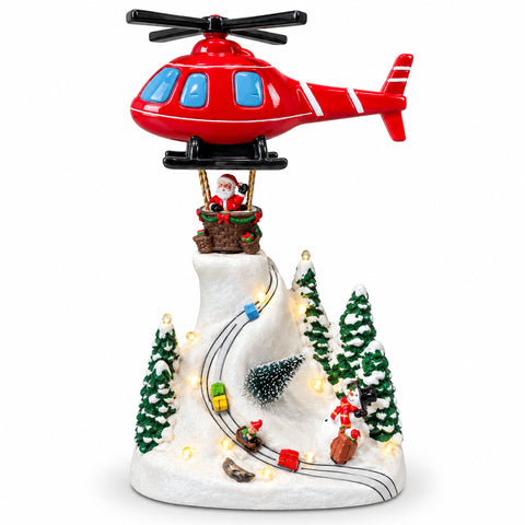 Paesaggio Natalizio con Babbo Natale in Volo, Luci LED e Musica