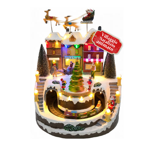 Villaggio Natalizio Luminoso Xmas Town a Batteria con Luci LED, Musica, Albero Rotante, Trenino in Movimento e Slitta di Babbo Natale, 27x25x34 cm